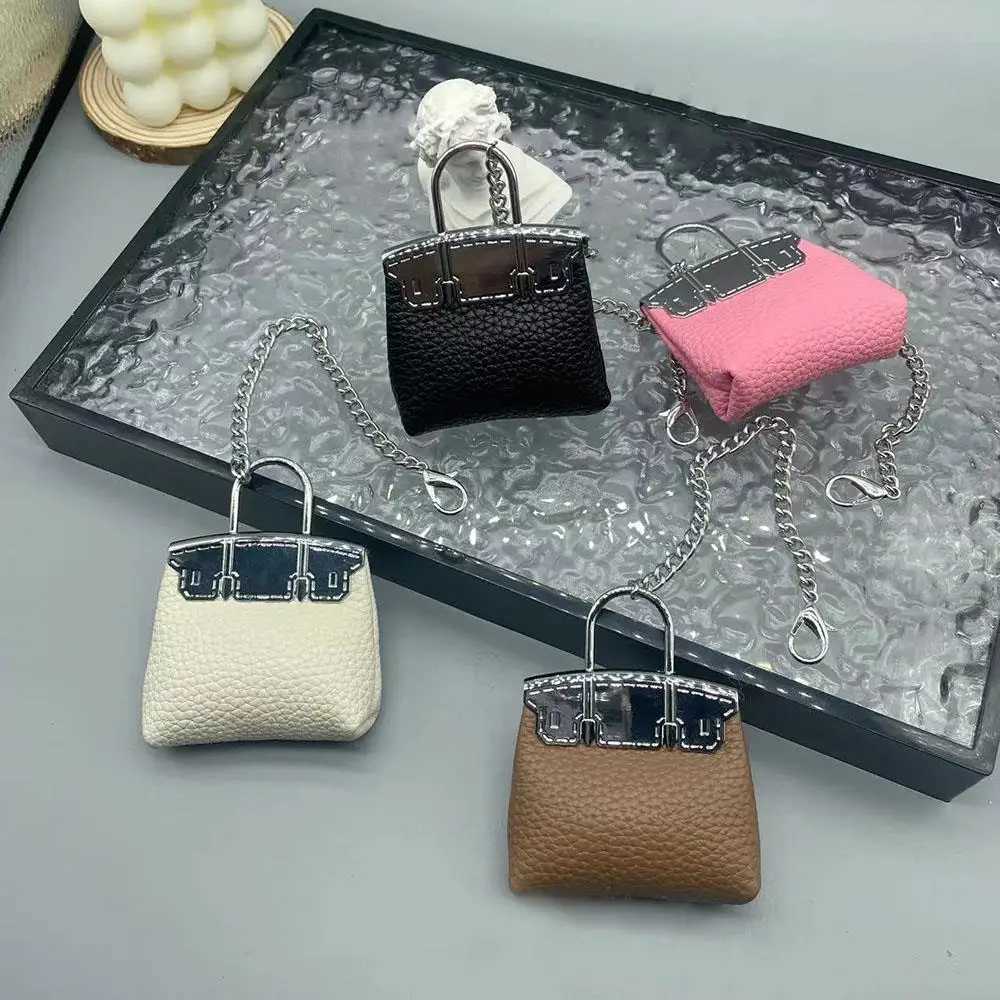 New Mini Bag Hanging Pendant High Quality Leather Car Keychain Hand Rope Small Bag Pendant Keychain Gifts Creative Earphone Bag W251021