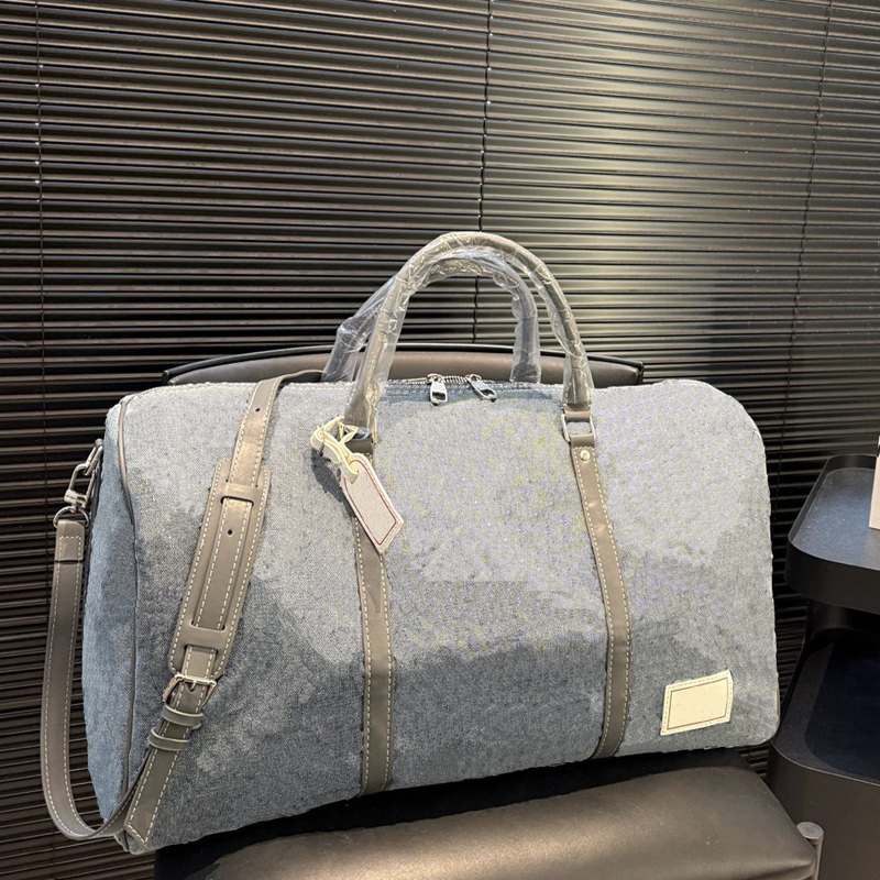 Fashion travel bag outdoor duffel bag denim material embossed print design large capacity 50cm handbag
