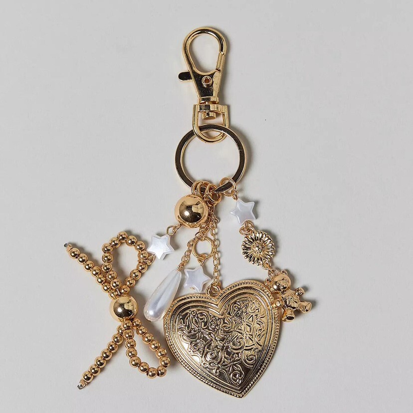 bag charms designer New Freepeople Fashion Personality Devil's Eye Metal Geometric Heart Pendant Woven Keychain key chain