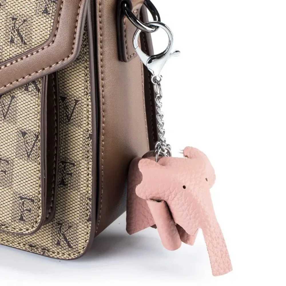 Top Layer Leather Keyring Cute Baby Elephant Key Chains for Women Creative Animal Car Keychain Soft Cowhide Handbag Doll Pendant W251021