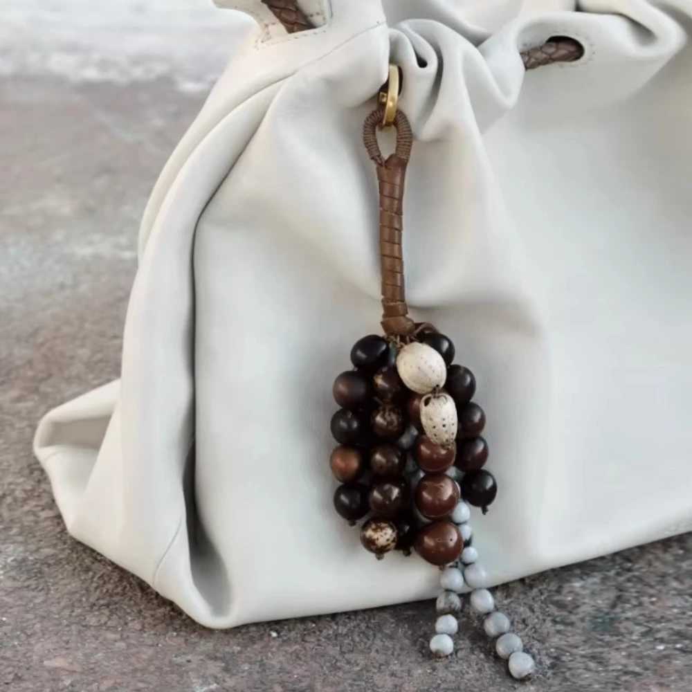 2025 Womens Popular Knitted Rope Keychain Leather Rope Bags Pendant Wallet Key Backpack Keyring Gift Bag Accessories J251121