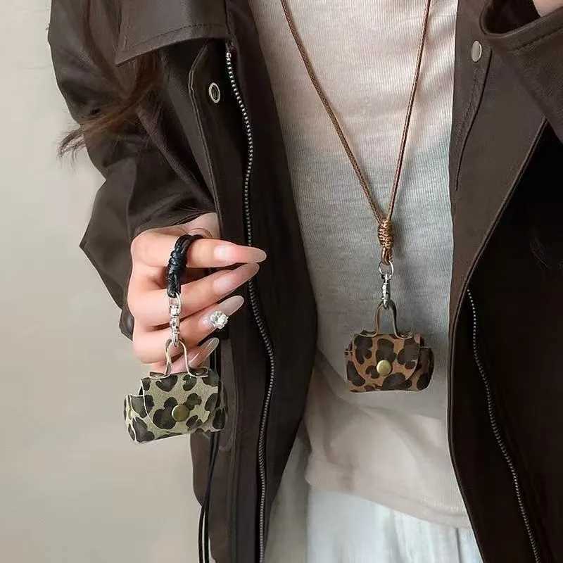 Mini and Compact Leather Hanging Neck Coin Purse Necklace Niche Design Headphone Bag Long Sweater Chain Accessory Women W251021