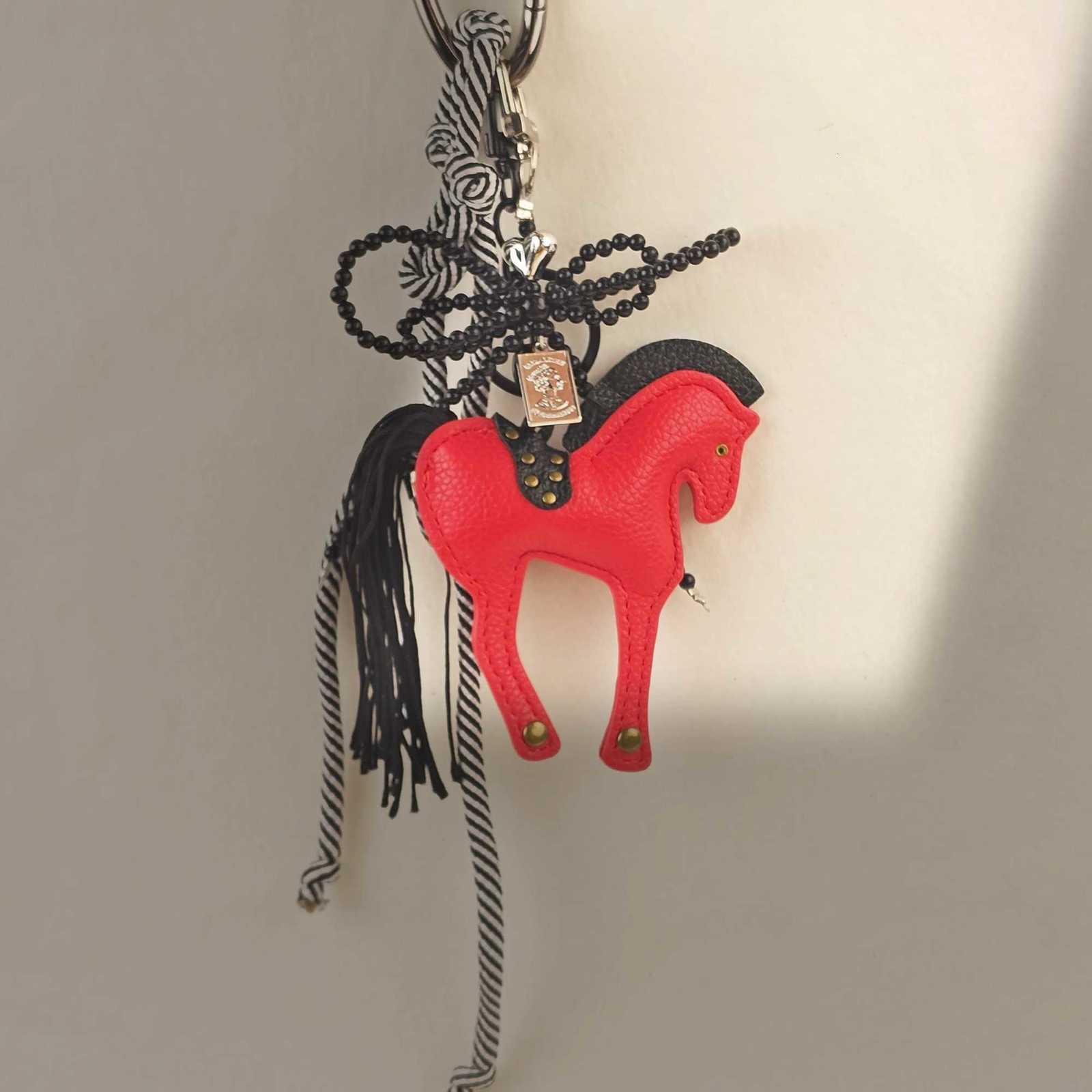New in Leather Horse Bag Charm Rope Bow Accessories Luxury Keychains Pendant Creative Ornament Gift W251021