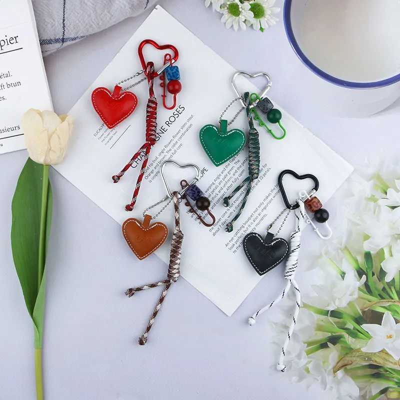 New Creative And Versatile Leather Heart Knot Rope Alloy Keychain Bag Decoration Pendant Key Ring Part Gift W251021