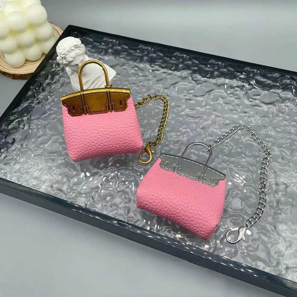 New Mini Bag Hanging Pendant High Quality Leather Car Keychain Hand Rope Small Bag Pendant Keychain Gifts Creative Earphone Bag W251021