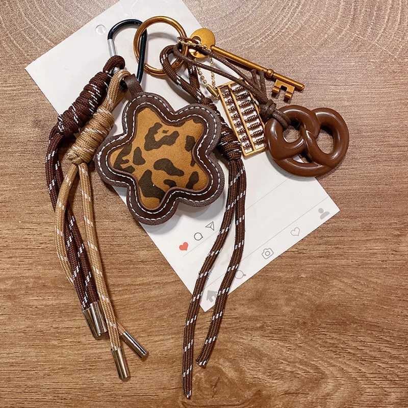 Braided Rope Keychain Leopard Print Flower Cream Bag Pendant Charm Fashion Bag Accessories for HandbagBackpack Decors J251121