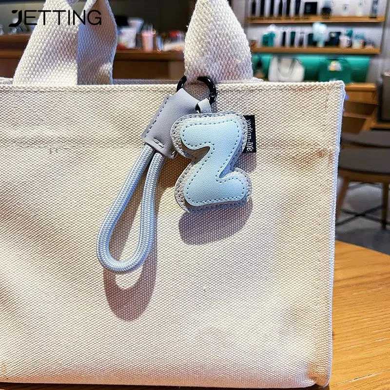 Creative Exquisite 26 English Letter Keychain PU Leather Bag Hanging Charms Alphabet Keyring Ornaments Lucky Pendant Couple Gift W251021