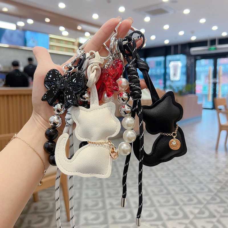 Bag Charms Purse Charms kit Keychains for WomenCute Leather Cat Pearl bowknot Keychain Bag Charm for Handbag Accessories Tready J251121