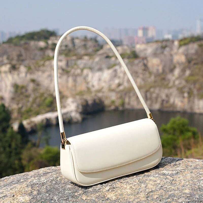 Cowhide Underarm New Niche Design Genuine Leather Vintage Commuter Saddle Fashionable Ladies Shoulder Bag Suotong1021