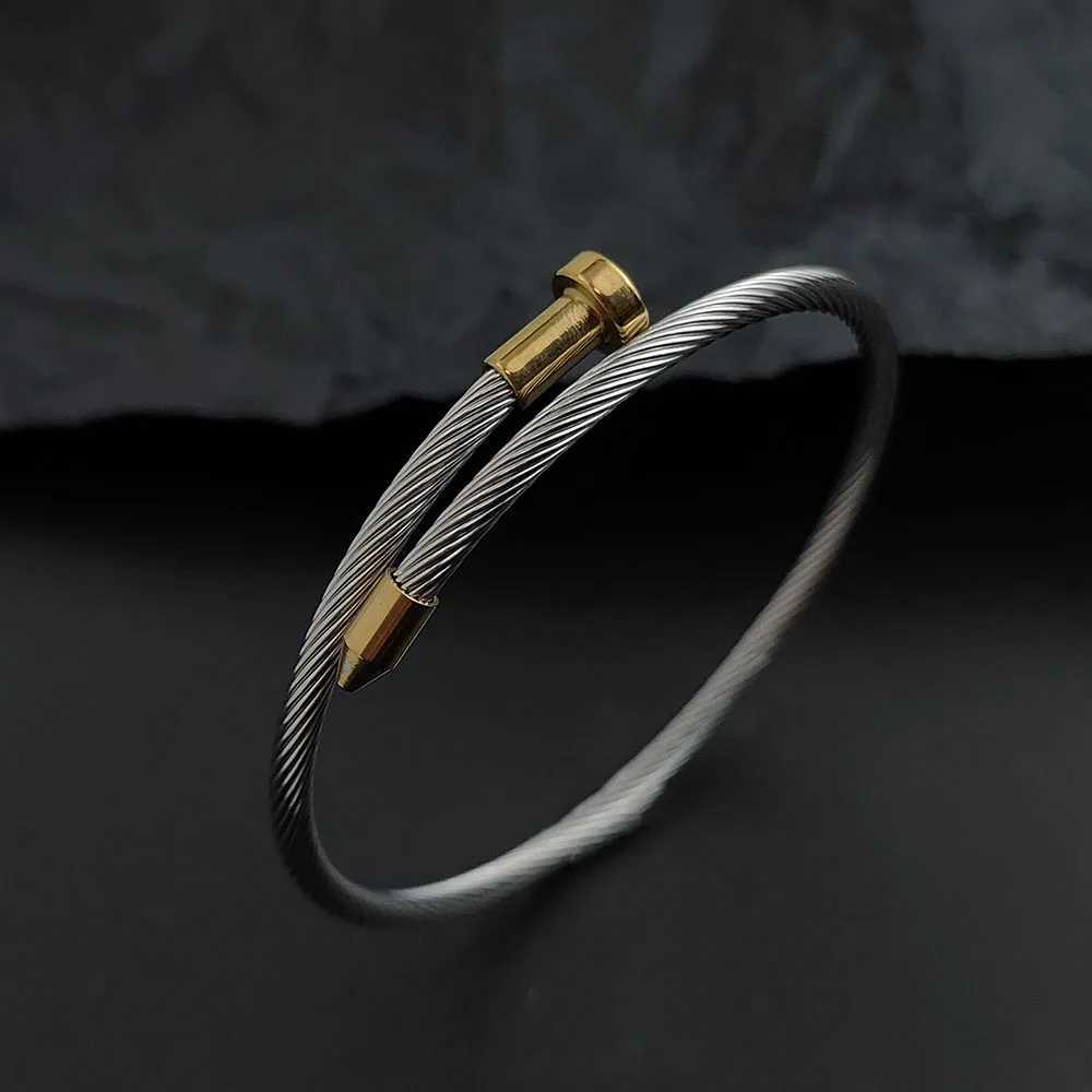 Luxcury Women's Goldtone Silver Finish Water Resistant Nail Design Bangle with Elegant Clasp Detailing