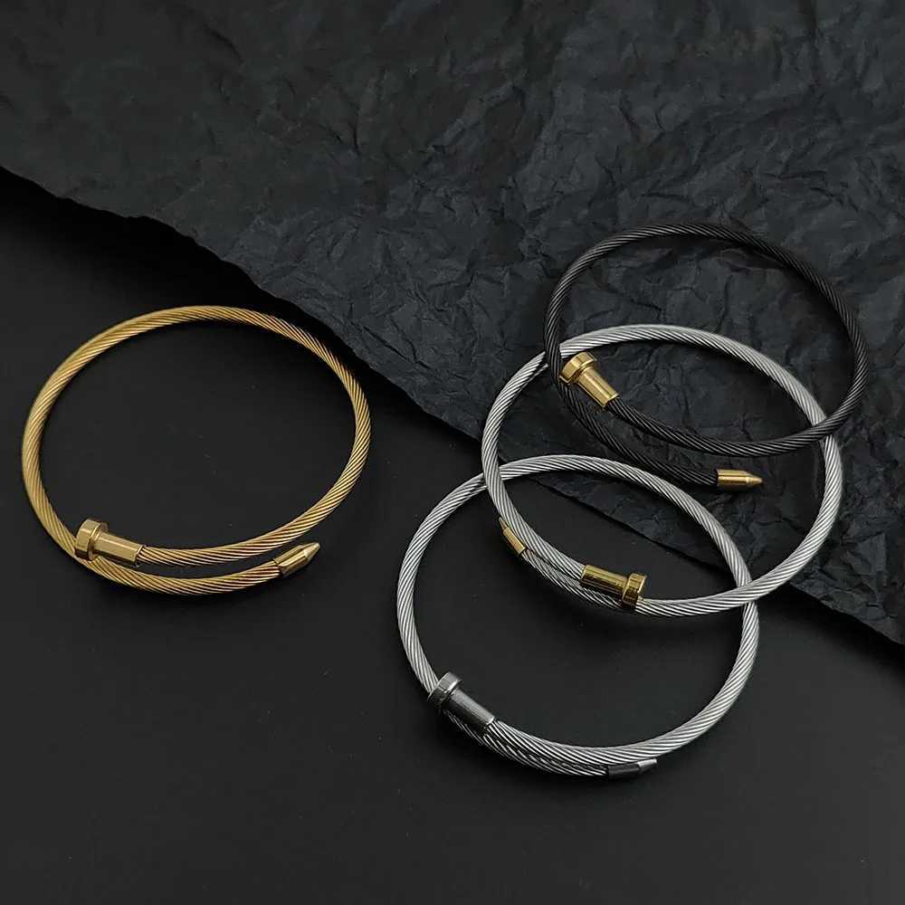 Luxcury Women's Goldtone Silver Finish Water Resistant Nail Design Bangle with Elegant Clasp Detailing