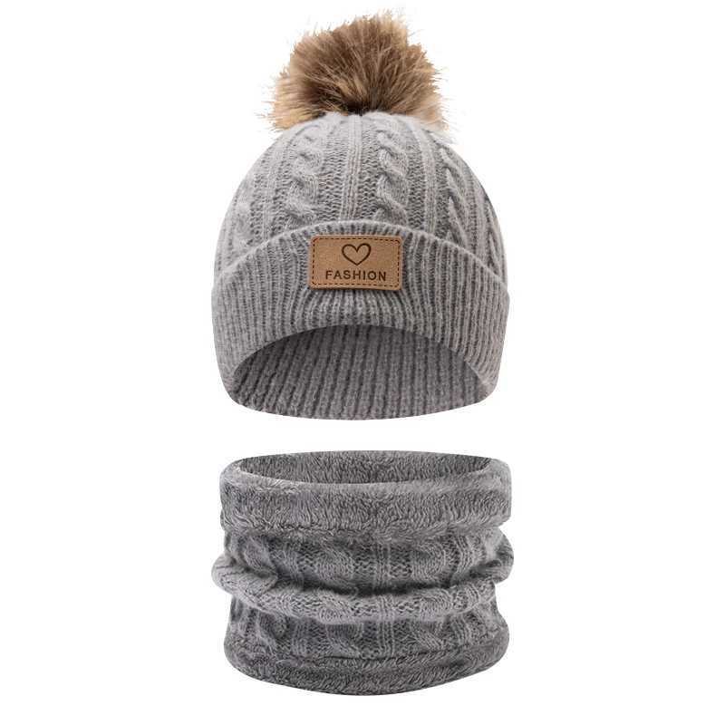 This set of childrens knitted singleball knitted hat and scarf is suitable for children aged 3 to 12 to wear J251021