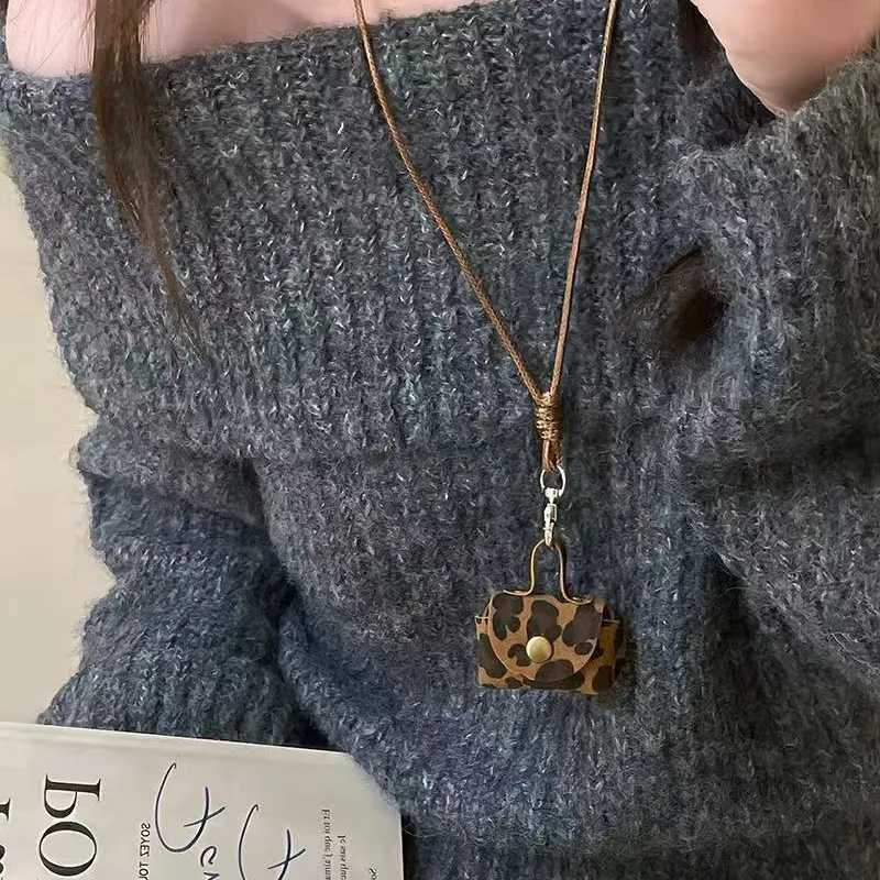 Mini and Compact Leather Hanging Neck Coin Purse Necklace Niche Design Headphone Bag Long Sweater Chain Accessory Women W251021