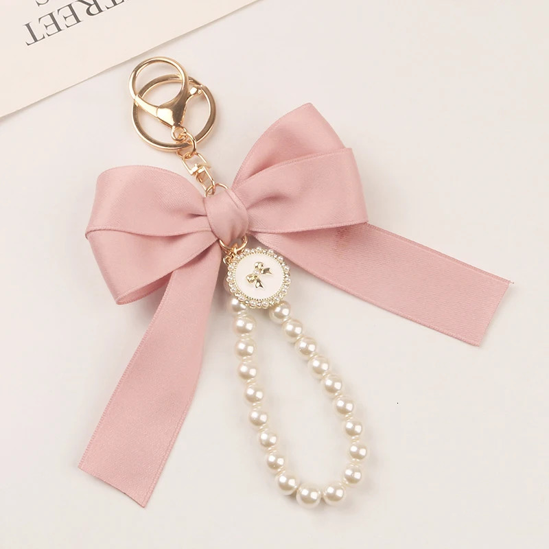 Bowknot Keychains Womens Pearl Chain Big Bow Tie Tote Hanging Ornament Bag Decorations DIY Headphone Case Accessories Kit Chain 251017