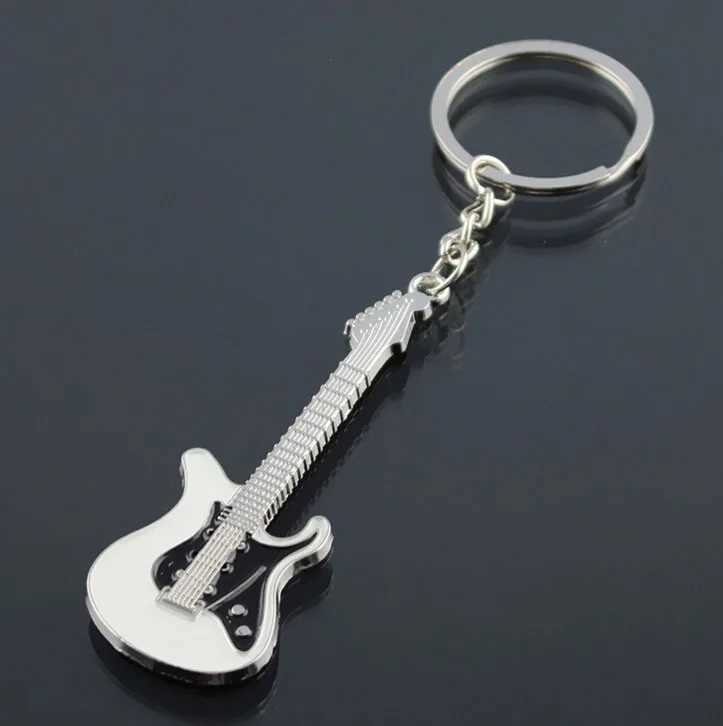 New Dice Key Chain Metal Personality Dice Poker Soccer Guitar Model Alloy Keychain Gift Car Key Ring 17045 W251021