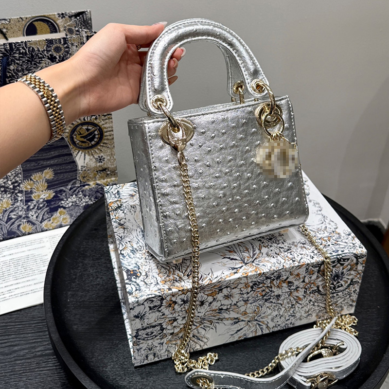 Designer bag, mini handbag, ostrich patterned leather appearance and quilted details, luxurious high-quality fashion bag.