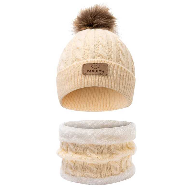 This set of childrens knitted singleball knitted hat and scarf is suitable for children aged 3 to 12 to wear J251021