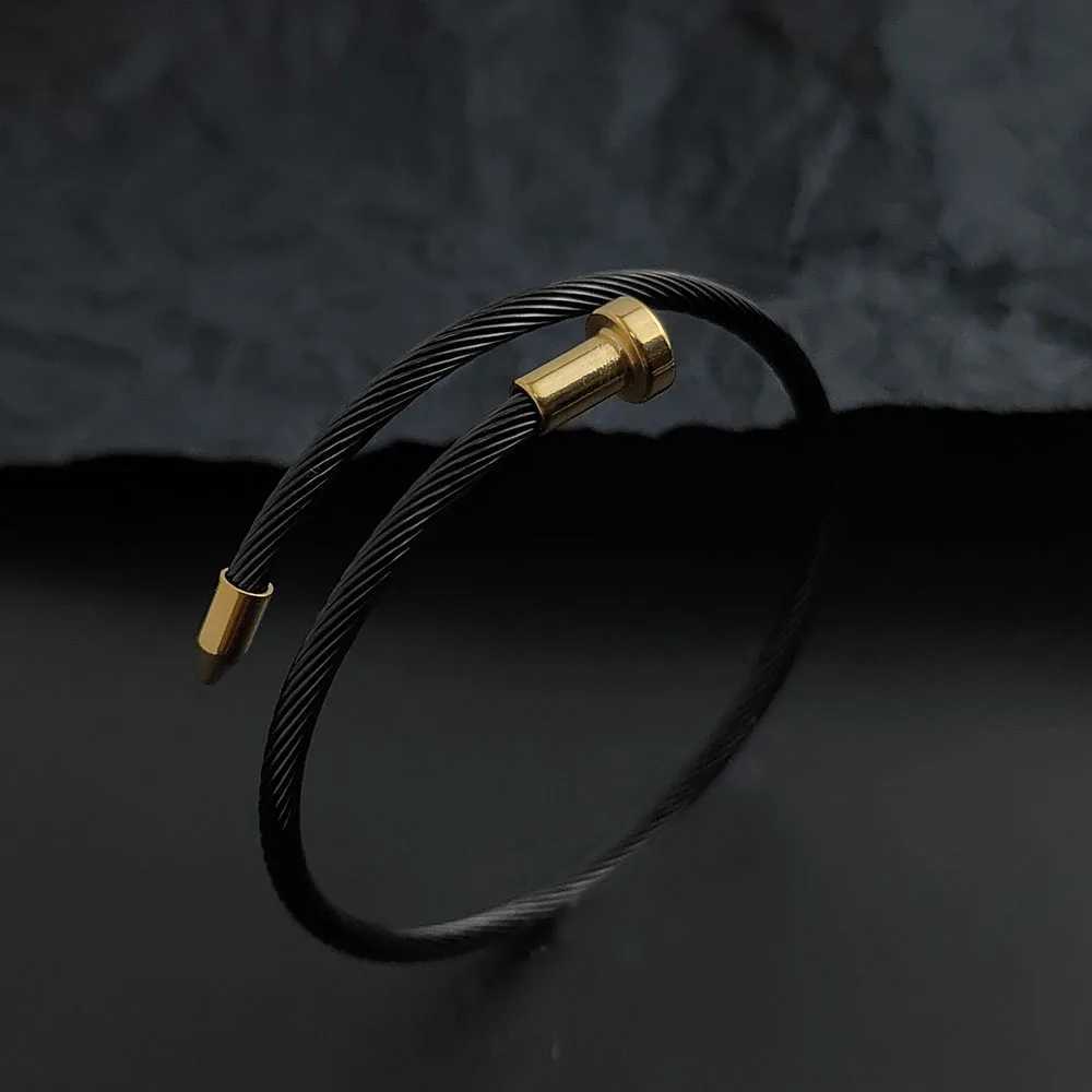 Luxcury Women's Goldtone Silver Finish Water Resistant Nail Design Bangle with Elegant Clasp Detailing