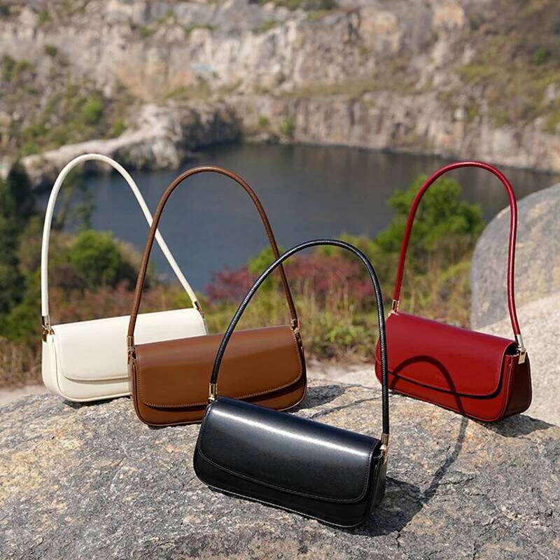 Cowhide Underarm New Niche Design Genuine Leather Vintage Commuter Saddle Fashionable Ladies Shoulder Bag Suotong1021