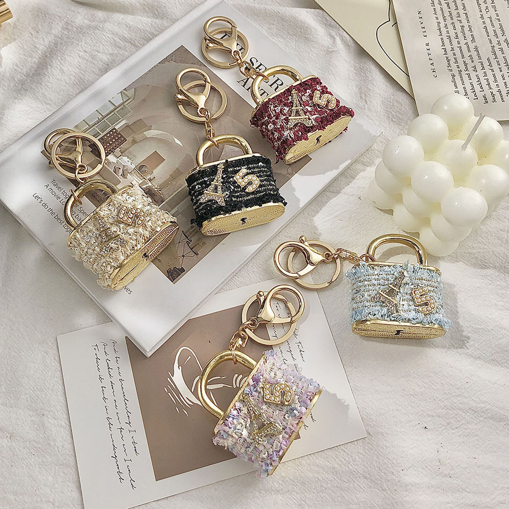 Keychains Lanyards bag charms designer Creative Small Gift Korean Velvet Ins Bag Lock Shape Pendant Metal Keychain Cartoon key chain
