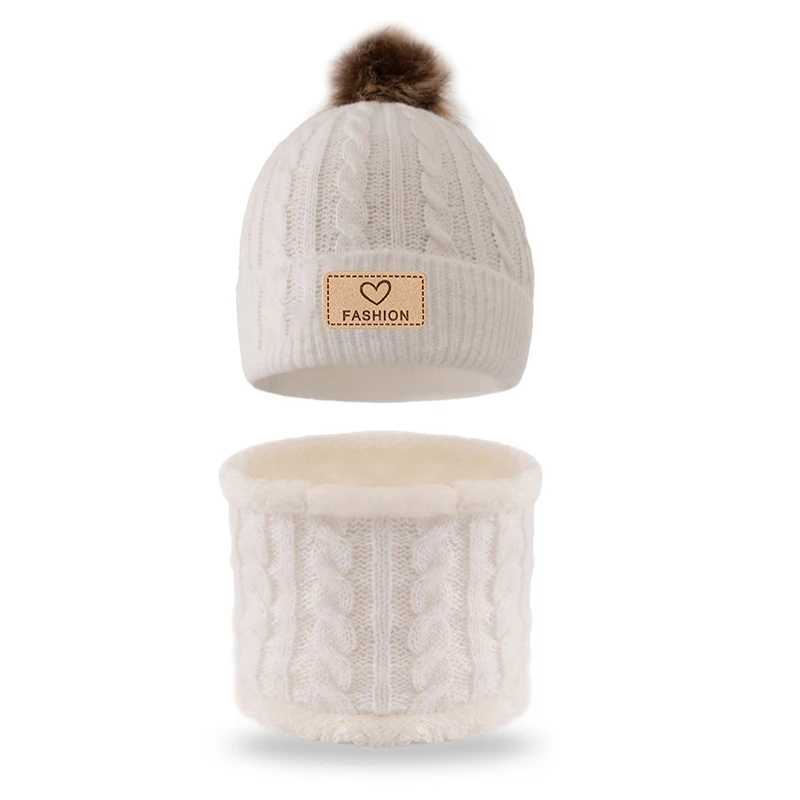 This set of childrens knitted singleball knitted hat and scarf is suitable for children aged 3 to 12 to wear J251021