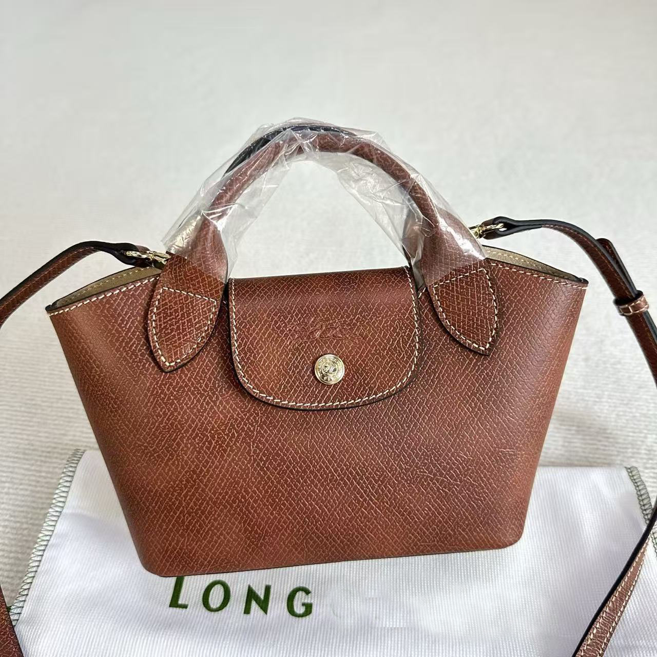 8a French Longchamp Mini Dumpling Commute Versatile Crossbody Handbag Womens Small Bag with Perforated Shoulder Strap Large Shopping Bag Portable Shopping Bag8