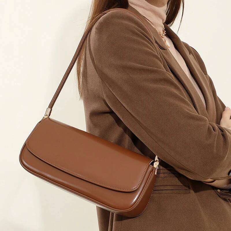 Cowhide Underarm New Niche Design Genuine Leather Vintage Commuter Saddle Fashionable Ladies Shoulder Bag Suotong1021