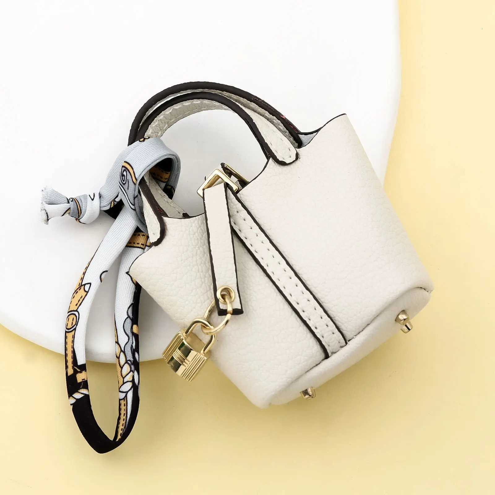 Mini Cute Basket Bag Pendant Leather Car Keychain Pendants Fashion Bluetooth Earphone Bag Small items Handbag Creative Gifts W251021