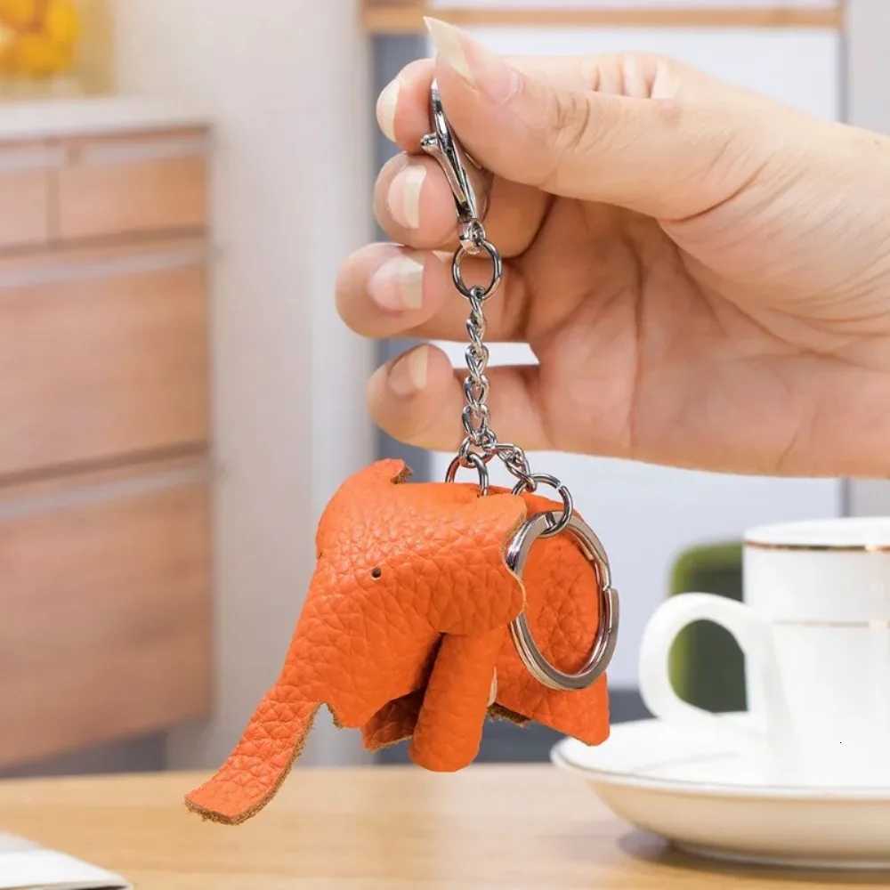 Top Layer Leather Keyring Cute Baby Elephant Key Chains for Women Creative Animal Car Keychain Soft Cowhide Handbag Doll Pendant W251021