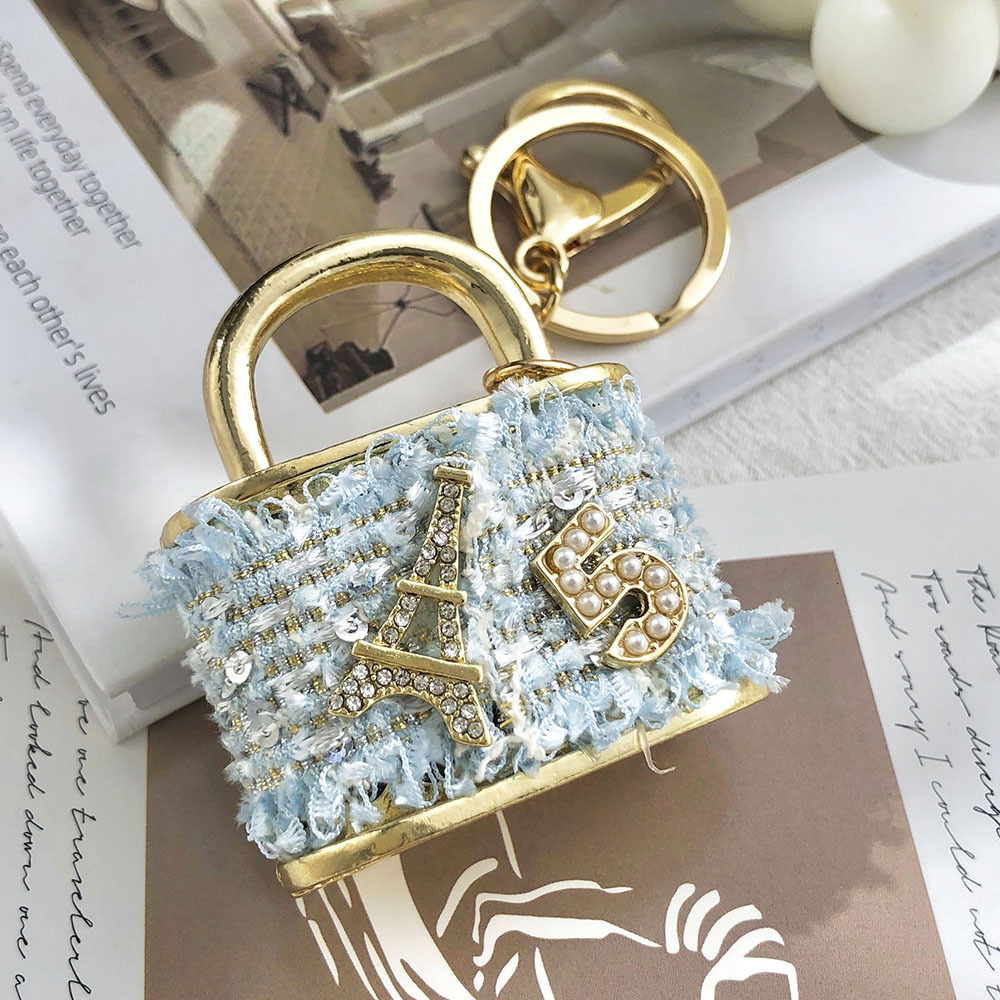 bag charms Creative Small Gift Korean Velvet Ins Bag Lock Shape Pendant Metal Keychain Cartoon key chain Z260130