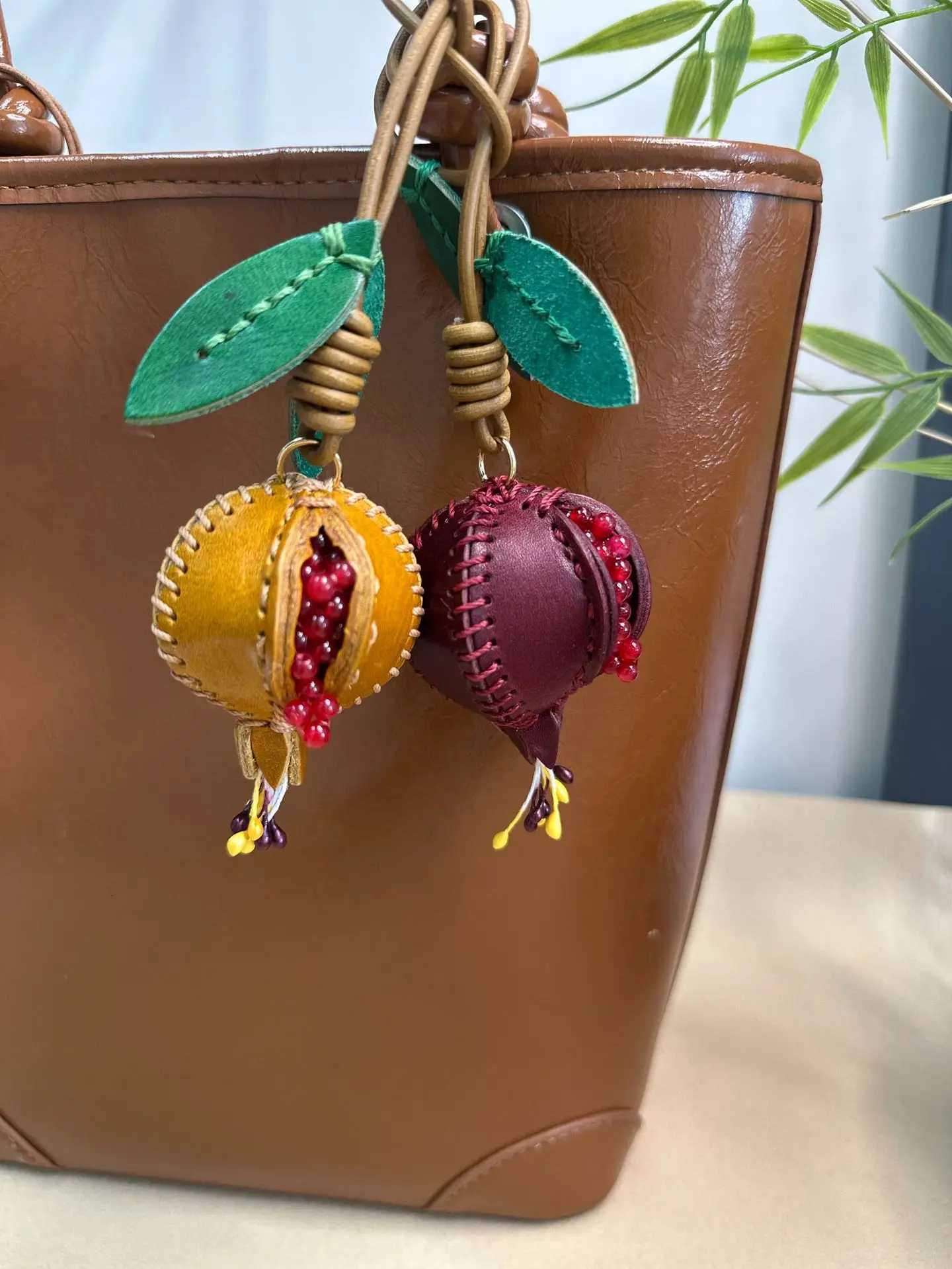 Luxurious Girls Cute Sweet Pomegranate Fruit Genuine Leather Charm Bag Keychain Car Rearview Mirror Decoration Accessory W251021