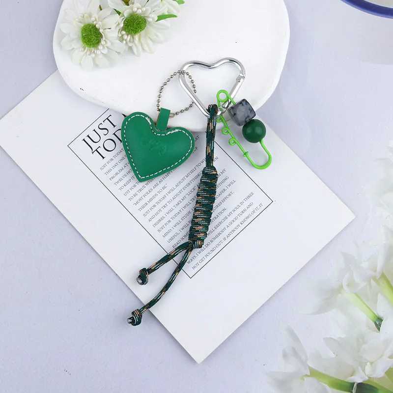New Creative And Versatile Leather Heart Knot Rope Alloy Keychain Bag Decoration Pendant Key Ring Part Gift W251021