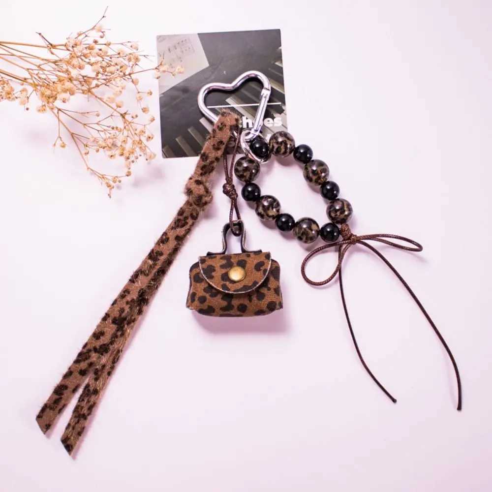 Leather Rope Luxury Bag Key Chain Coin Purse Exquisite Luxury Bag Lucky Pendant Leopard Print Crafts Car Key Ring Bag Hanging W251021