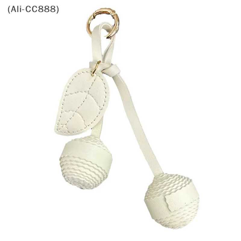 CC88New Leather Leaf Exquisite Cherry Braided Ball Bag Pendant Keychain Womens Bag Decoration Accessories W251021