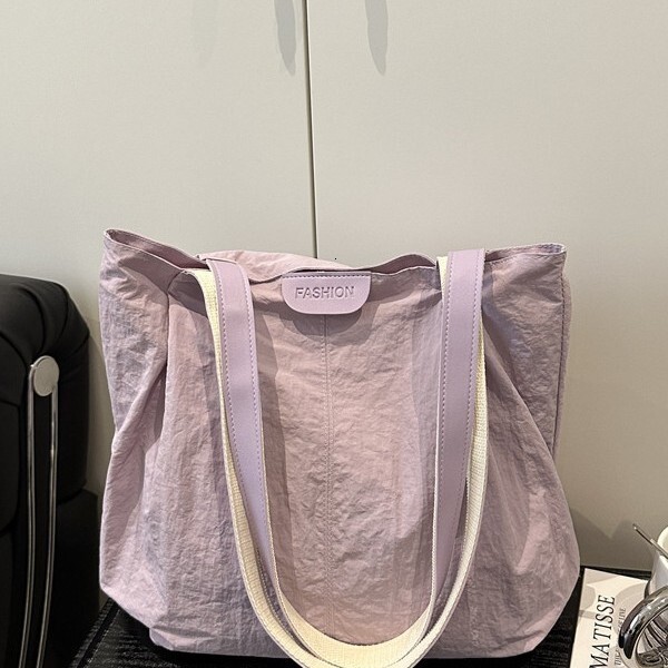 Latest popular fashion designer casual commuting simple college student casual practical handbag