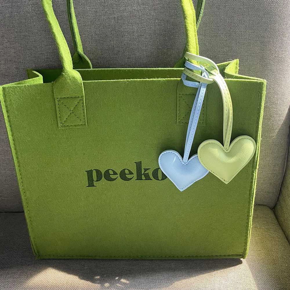 Fashion PU Leather HeartShaped Key Chain Cotton Peach Heart Bag Pendant Car Bag Accessories Key Ring Wholesale Jewelry W251021