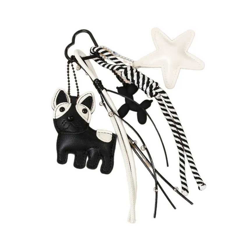 Designer womens bag black white wind cute magic doggie star leather bag pendant niche creative versatile accessories pendant J251121