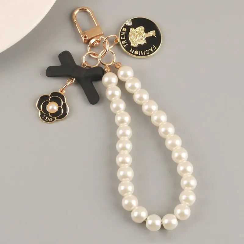 Bowknot Keychains Womens Pearl Chain Big Bow Tie Tote Hanging Ornament Bag Decorations DIY Headphone Case Accessories Kit Chain 251017