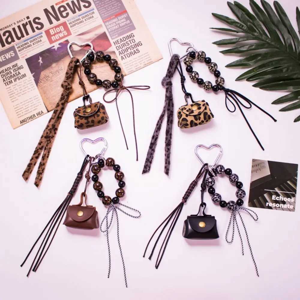 Leather Rope Luxury Bag Key Chain Coin Purse Exquisite Luxury Bag Lucky Pendant Leopard Print Crafts Car Key Ring Bag Hanging W251021