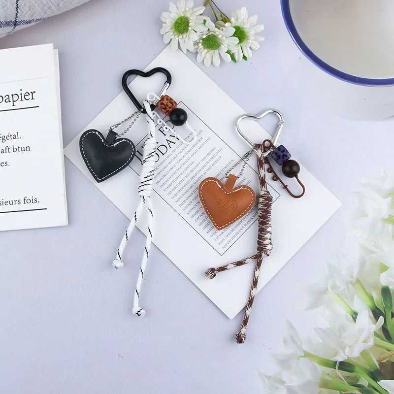 New Creative And Versatile Leather Heart Knot Rope Alloy Keychain Bag Decoration Pendant Key Ring Part Gift W251021