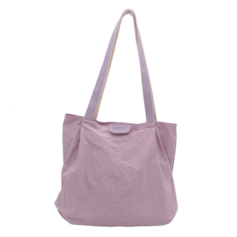 Latest popular fashion designer casual commuting simple college student casual practical handbag