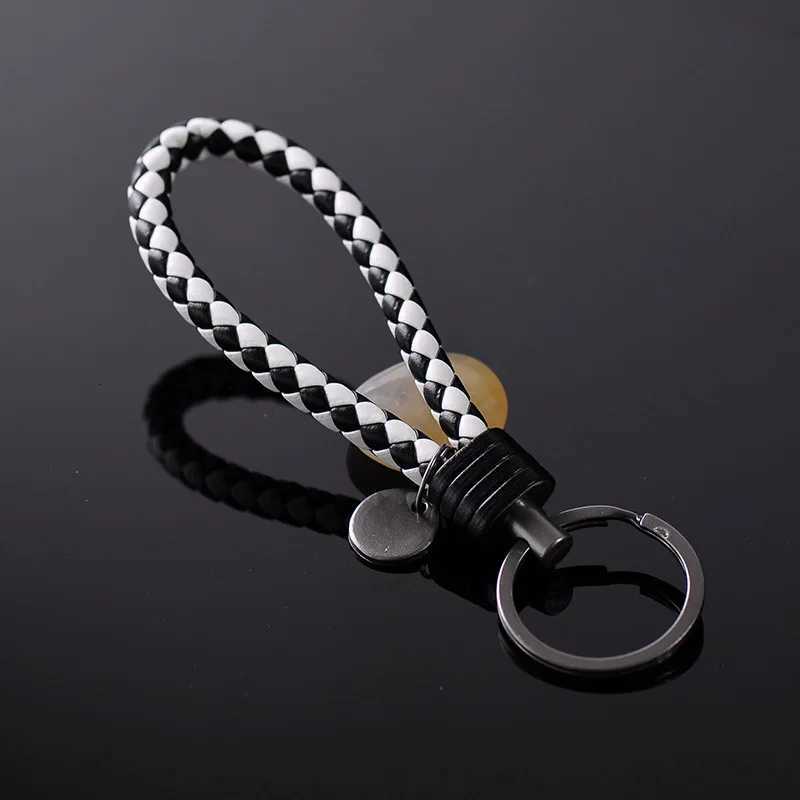 New Creative Tungsten Steel Braided Rope Keychain Leather Key Chain Handmade Doll Pendant Party Gift Small Jewelry W251021