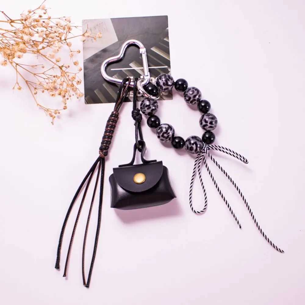 Leather Rope Luxury Bag Key Chain Coin Purse Exquisite Luxury Bag Lucky Pendant Leopard Print Crafts Car Key Ring Bag Hanging W251021