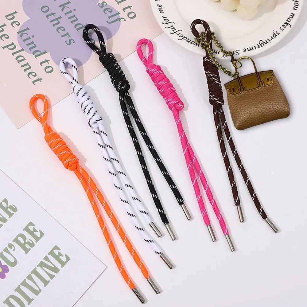 New Mini Bag Hanging Pendant High Quality Leather Car Keychain Hand Rope Small Bag Pendant Keychain Gifts Creative Earphone Bag W251021
