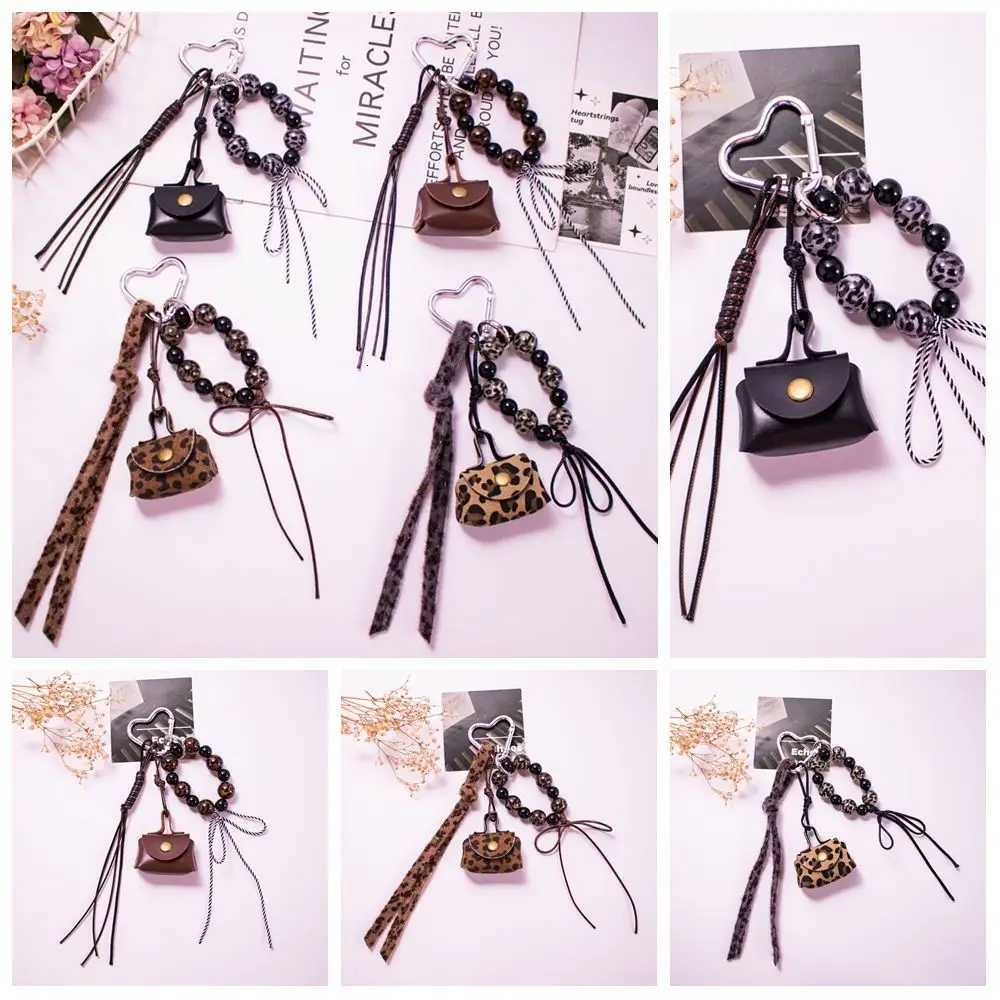 Leather Rope Luxury Bag Key Chain Coin Purse Exquisite Luxury Bag Lucky Pendant Leopard Print Crafts Car Key Ring Bag Hanging W251021