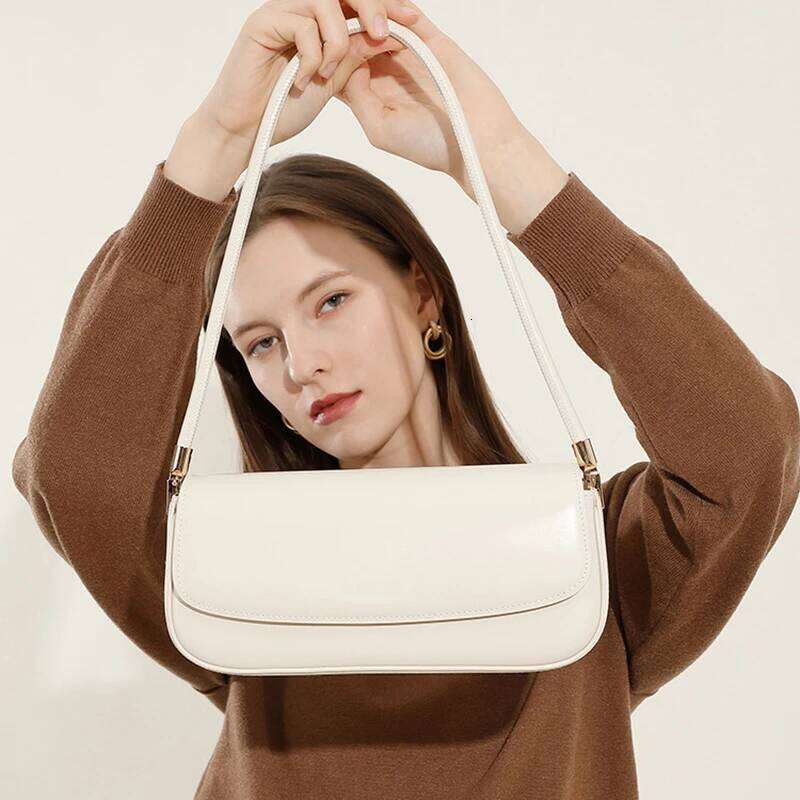 Cowhide Underarm New Niche Design Genuine Leather Vintage Commuter Saddle Fashionable Ladies Shoulder Bag Suotong1021