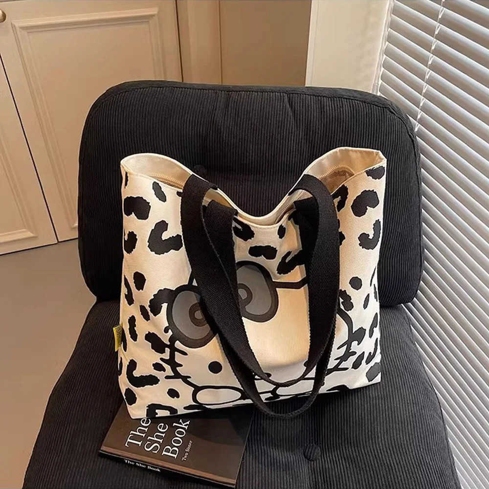 Sanrio Cartoon Cute Hello Kitty Large Capacity Canvas Shoulder Bag Fashion Retro Girl Daily Commuting Casual Handbag Women Gifts L251022