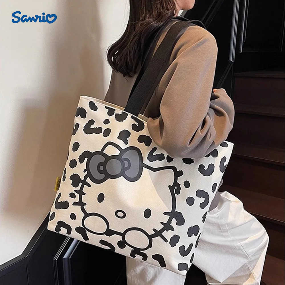 Sanrio Cartoon Cute Hello Kitty Large Capacity Canvas Shoulder Bag Fashion Retro Girl Daily Commuting Casual Handbag Women Gifts L251022