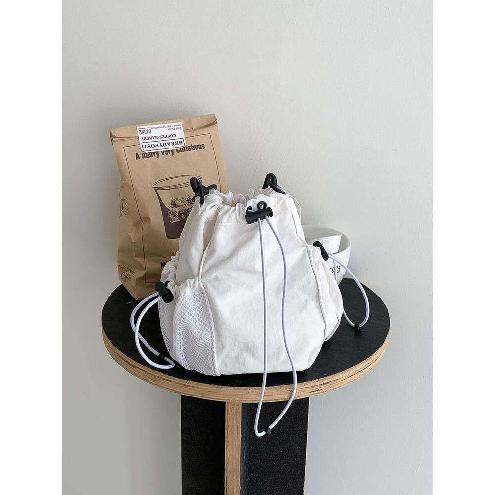 New Bucket Drawstring Pleated Nylon Casual Versatile Summer Shoulder For Women Niche Korean Style Crossbody Small Bag B5