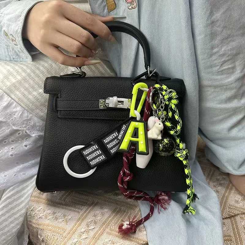 Sports Series Key chain Multielement Backpack pendant Hand woven rope shoulder bag decoration J251121